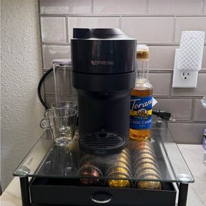 Nespresso Vertuo Plus Black Coffee Maker with Pod Holder and few dozen pods